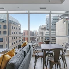 High-Floor Downtown 1BR+Den | City Views