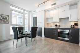 Executive Downtown 1BR | Dedicated Workspace - Image 4