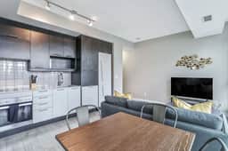 High-Floor Downtown 1BR+Den | City Views - Image 3